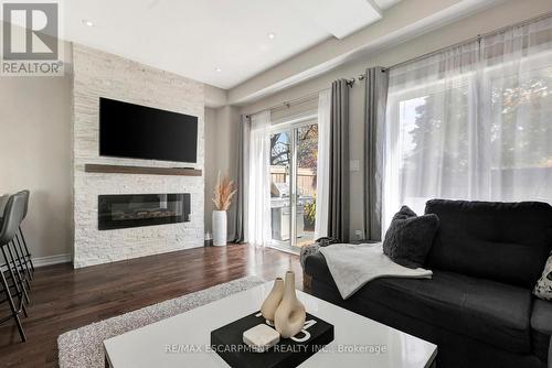 1 - 377 Glancaster Road, Hamilton, ON - Indoor Photo Showing Living Room With Fireplace