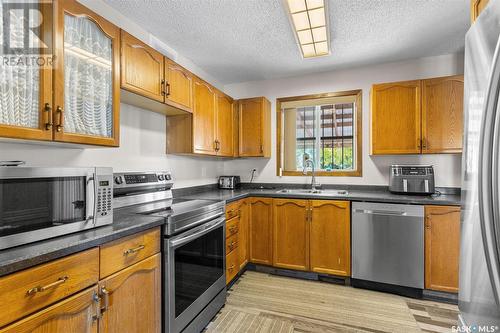 1347 Junor Avenue, Saskatoon, SK - Indoor Photo Showing Kitchen With Double Sink