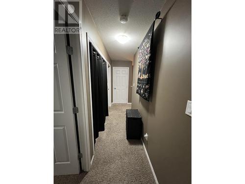 7 4620 E 52 Avenue, Fort Nelson, BC - Indoor Photo Showing Other Room