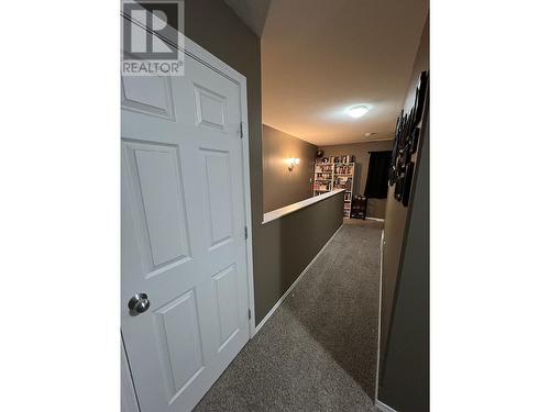 7 4620 E 52 Avenue, Fort Nelson, BC - Indoor Photo Showing Other Room