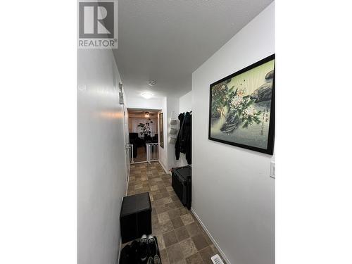 7 4620 E 52 Avenue, Fort Nelson, BC - Indoor Photo Showing Other Room