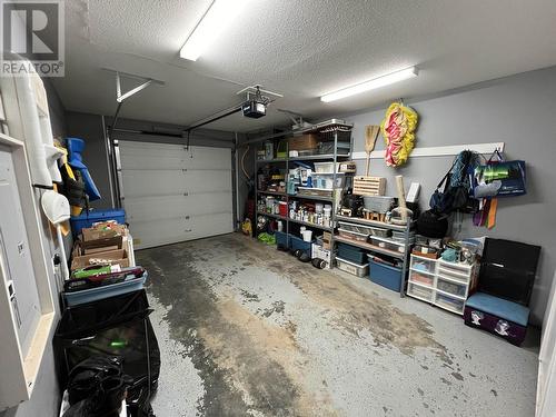 7 4620 E 52 Avenue, Fort Nelson, BC - Indoor Photo Showing Garage