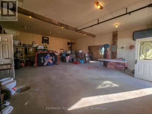 313 Champagne St.  (Ramore), Black River-Matheson, ON - Indoor Photo Showing Garage