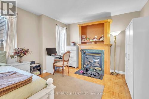 27 Putnam Drive, Brampton, ON - Indoor Photo Showing Bedroom With Fireplace