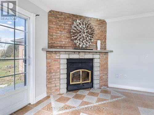 891 Hwy 8, Hamilton, ON - Indoor Photo Showing Living Room With Fireplace