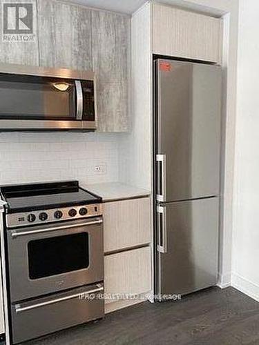 312 - 251 Manitoba Street, Toronto, ON - Indoor Photo Showing Kitchen With Stainless Steel Kitchen