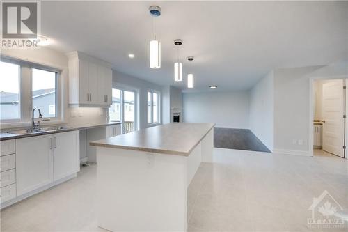 283 Station Trail Street, Russell, ON - Indoor Photo Showing Kitchen With Double Sink