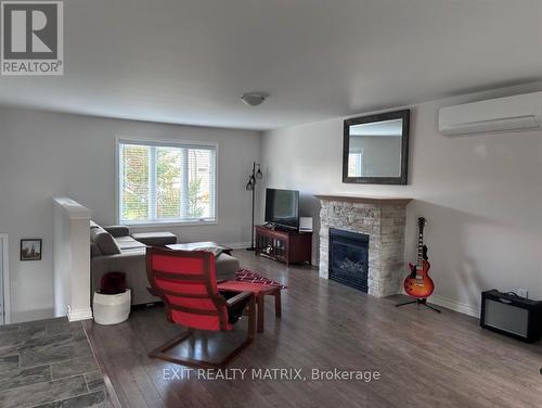 196 Herbert Street, The Nation, ON - Indoor Photo Showing Living Room With Fireplace