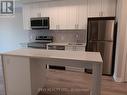 213 - 480 Gordon Krantz Avenue, Milton, ON  - Indoor Photo Showing Kitchen With Stainless Steel Kitchen With Upgraded Kitchen 