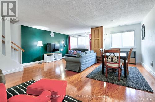 135 - 4001 Don Mills Road, Toronto, ON - Indoor Photo Showing Living Room