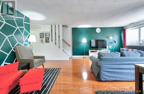 135 - 4001 Don Mills Road, Toronto, ON - Indoor Photo Showing Living Room