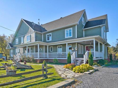 FaÃ§ade - 5142 Ch. Salaberry, Carignan, QC - Outdoor With Deck Patio Veranda With Facade