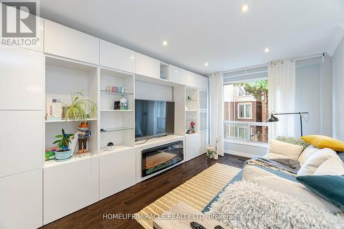 43 Festival Drive, Toronto, ON - Indoor Photo Showing Living Room With Fireplace