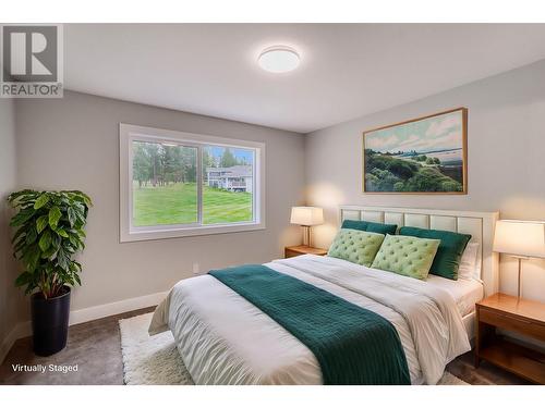 105 Corral Boulevard, Cranbrook, BC - Indoor Photo Showing Bedroom