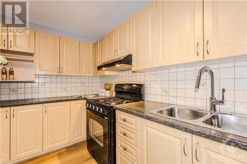 122 Whernside Terrace, Kanata, ON - Indoor Photo Showing Kitchen With Double Sink