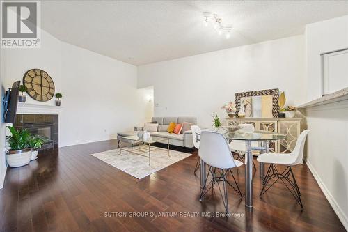 411 - 1370 Main Street E, Milton, ON - Indoor Photo Showing Other Room With Fireplace