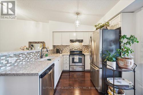 411 - 1370 Main Street E, Milton, ON - Indoor Photo Showing Kitchen