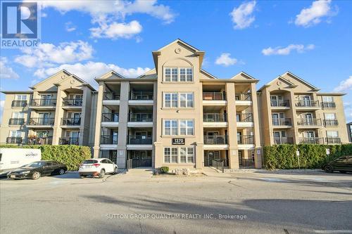 411 - 1370 Main Street E, Milton, ON - Outdoor With Facade