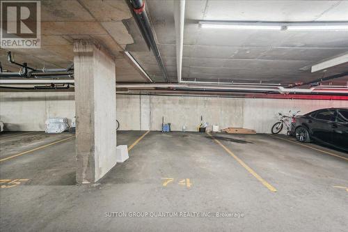 411 - 1370 Main Street E, Milton, ON - Indoor Photo Showing Garage