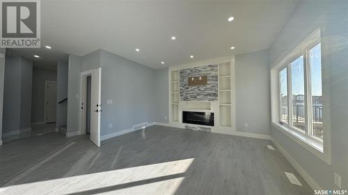 714 Delainey Court, Saskatoon, SK - Indoor With Fireplace