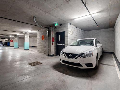 Garage - 207-605 Rue De L'Escale, Brossard, QC - Indoor Photo Showing Garage