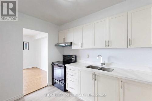 2003 - 5 Massey Square, Toronto, ON - Indoor Photo Showing Kitchen With Double Sink