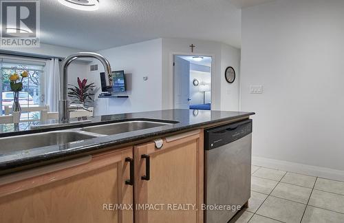 105 - 61 Clarington Boulevard N, Clarington (Bowmanville), ON - Indoor Photo Showing Kitchen With Double Sink