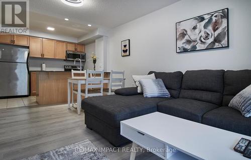 105 - 61 Clarington Boulevard N, Clarington (Bowmanville), ON - Indoor Photo Showing Living Room