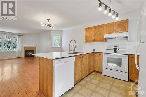 103 Strathaven Private, Ottawa, ON - Indoor Photo Showing Kitchen With Fireplace