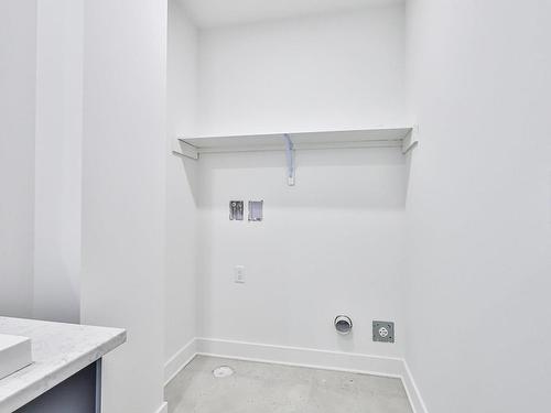 Salle de lavage - 52A Rue Cousineau, Laval (Pont-Viau), QC - Indoor With Storage