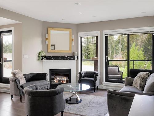 319-1335 Bear Mountain Pkwy, Langford, BC - Indoor Photo Showing Living Room With Fireplace