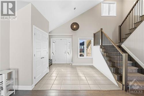 Enter through the main door into the foyer that overflows with natural light. - 71 York Crossing, Russell, ON - Indoor Photo Showing Other Room