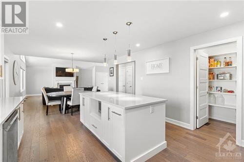 The kitchen features an oversized island for prepping meals or hosting. - 71 York Crossing, Russell, ON - Indoor Photo Showing Kitchen With Upgraded Kitchen