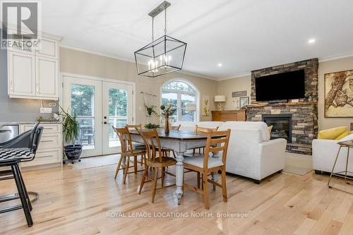 1035 Laidlaw Avenue, Gravenhurst, ON - Indoor Photo Showing Dining Room With Fireplace