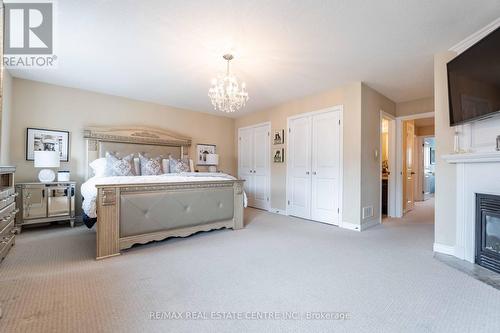 10 - 45 Seabreeze Crescent, Hamilton, ON - Indoor Photo Showing Bedroom With Fireplace