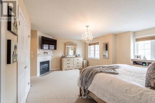 10 - 45 Seabreeze Crescent, Hamilton, ON - Indoor Photo Showing Bedroom With Fireplace