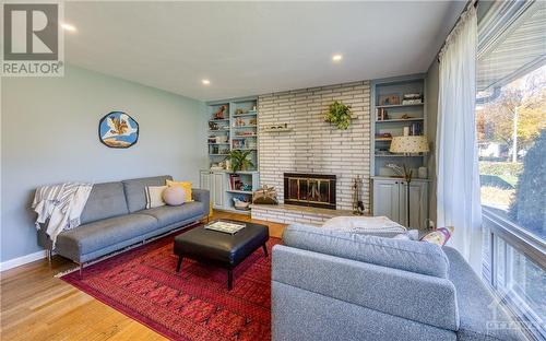 1136 Soderlind Street, Ottawa, ON - Indoor Photo Showing Living Room With Fireplace