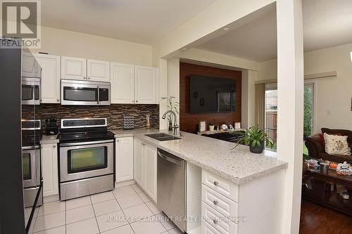 670 Lott Crescent, Milton, ON - Indoor Photo Showing Kitchen With Double Sink