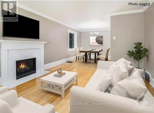 4 Middleton Drive, Ottawa, ON - Indoor Photo Showing Living Room With Fireplace