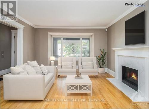 4 Middleton Drive, Ottawa, ON - Indoor Photo Showing Living Room With Fireplace