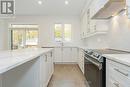 91 Berkely Street, Wasaga Beach, ON  - Indoor Photo Showing Kitchen With Upgraded Kitchen 