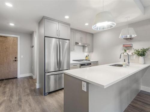 401-741 Travino Lane, Saanich, BC - Indoor Photo Showing Kitchen With Double Sink With Upgraded Kitchen