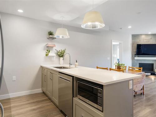 401-741 Travino Lane, Saanich, BC - Indoor Photo Showing Kitchen With Double Sink