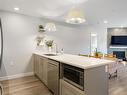 401-741 Travino Lane, Saanich, BC  - Indoor Photo Showing Kitchen With Double Sink 