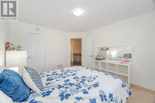 36 - 1000 Asleton Boulevard, Milton, ON - Indoor Photo Showing Bedroom