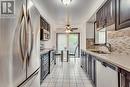 73 - 2550 Thomas Street, Mississauga, ON  - Indoor Photo Showing Kitchen With Stainless Steel Kitchen With Double Sink With Upgraded Kitchen 