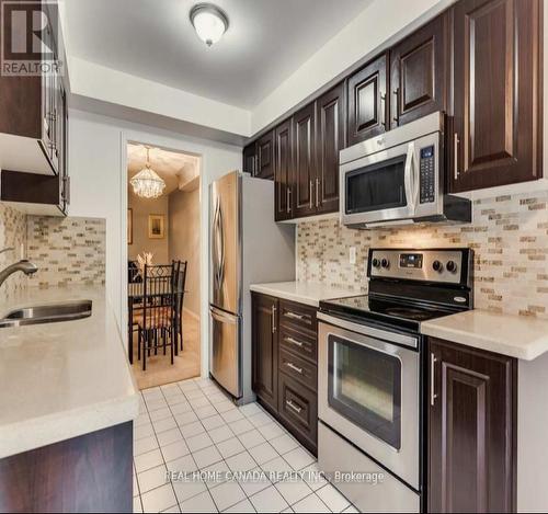 73 - 2550 Thomas Street, Mississauga, ON - Indoor Photo Showing Kitchen With Stainless Steel Kitchen