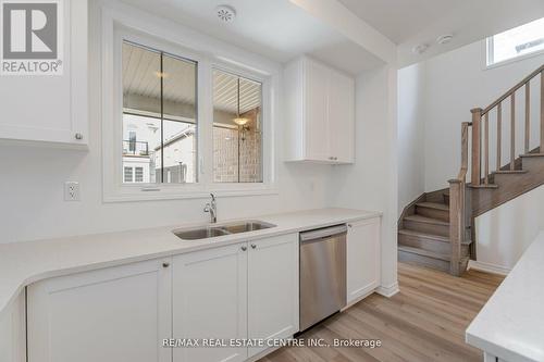 75 - 1317 Leriche Way E, Milton, ON - Indoor Photo Showing Kitchen With Double Sink