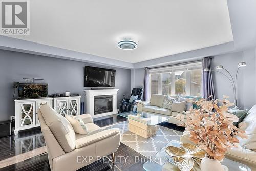 5743 Jake Crescent, Niagara Falls, ON - Indoor Photo Showing Living Room With Fireplace