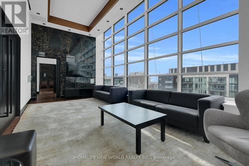 311 - 501 Adelaide Street W, Toronto, ON - Indoor Photo Showing Living Room With Fireplace